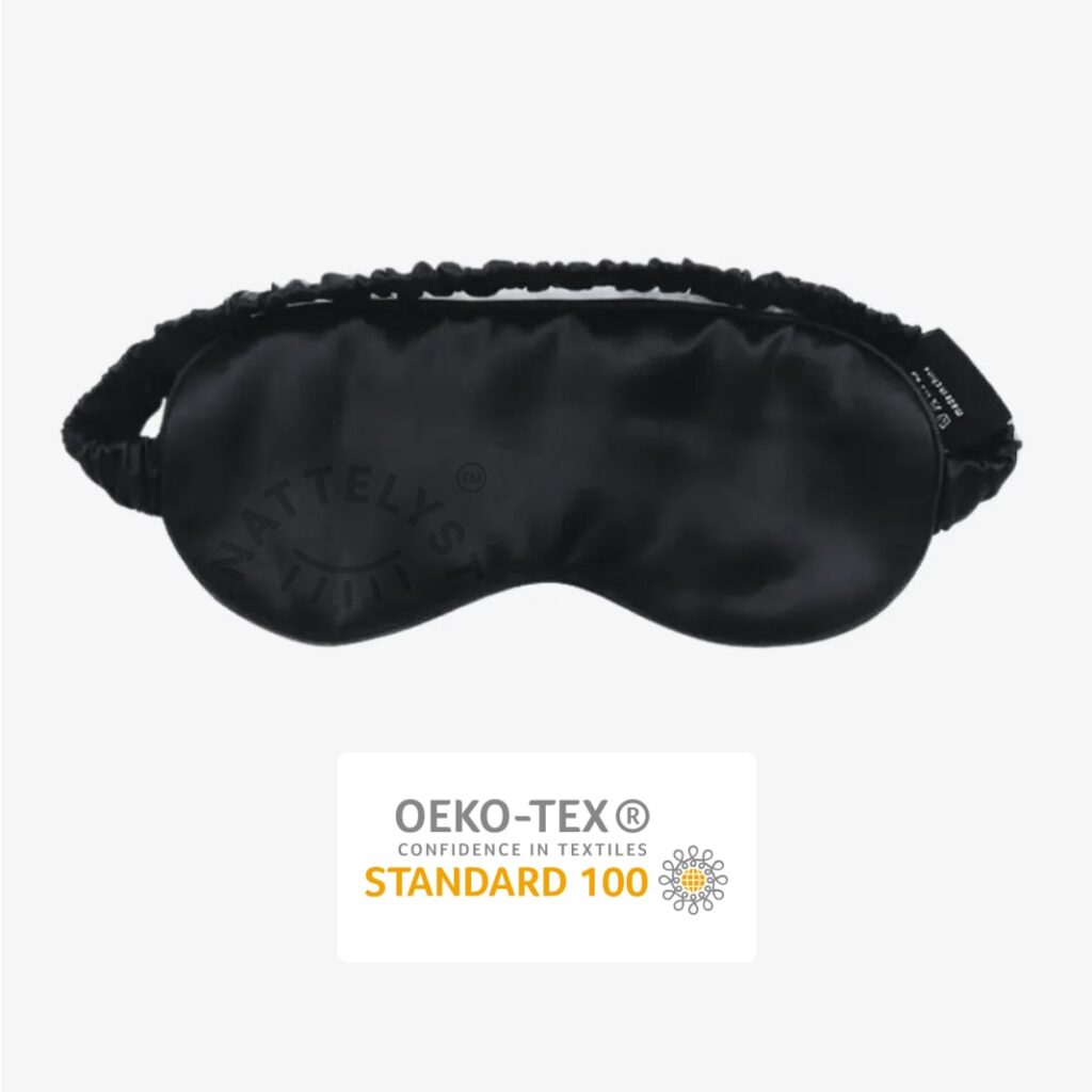 Schwarze satinähnliche Schlafmaske mit elastischem Riemen und OEKO‑TEX Standard 100 Zertifikat